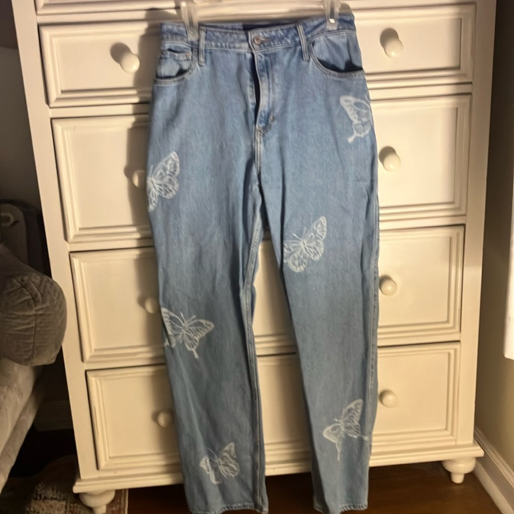 butterfly patterned jeans